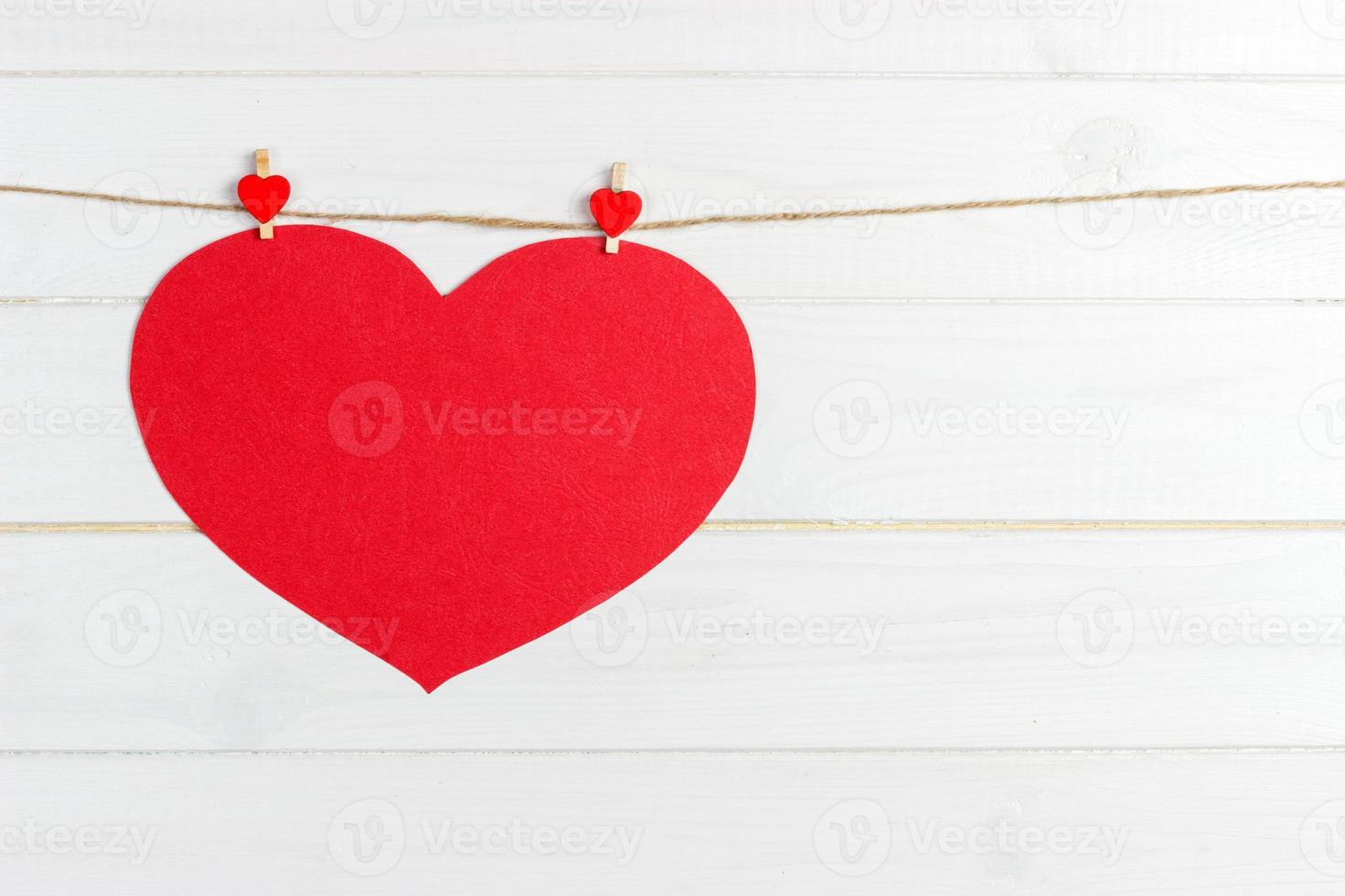 Love paper heart on string. Valentine day concept, copy space photo