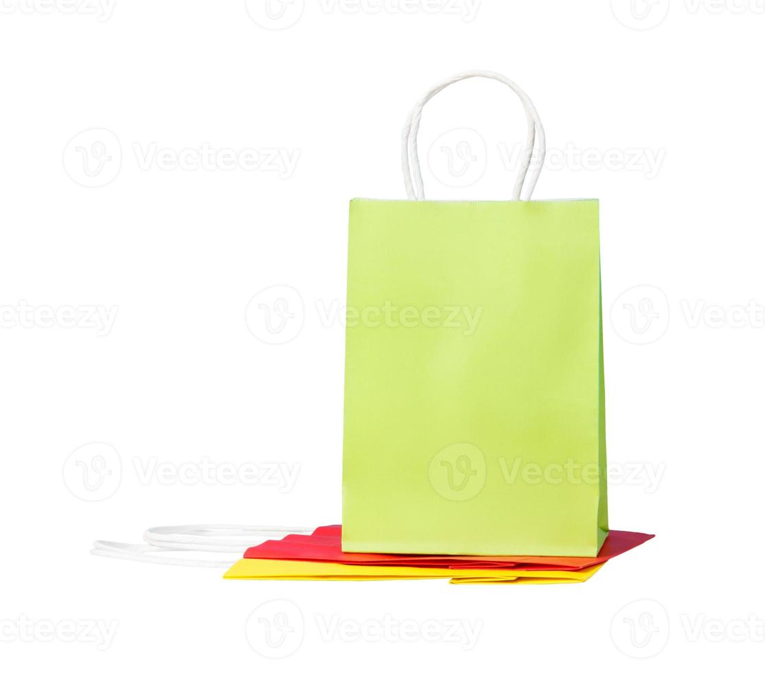 Three color paper bags, isolated on white photo