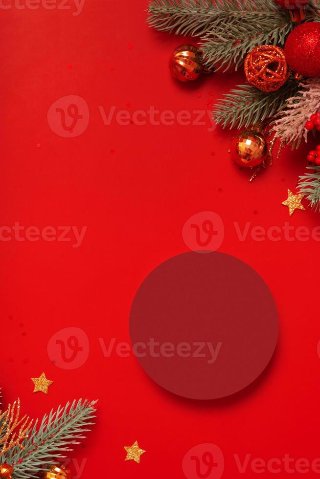 Mock up podium or pedestal for skincare beauty products and Christmas decorations top view on red background photo