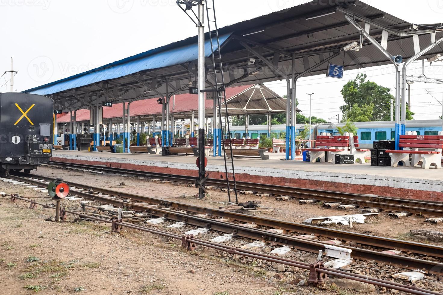 View of Toy train Railway Tracks from the middle during daytime near Kalka railway station in India, Toy train track view, Indian Railway junction, Heavy industry photo