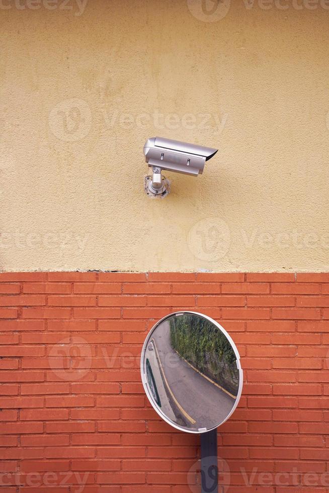 security camera on the building wall photo