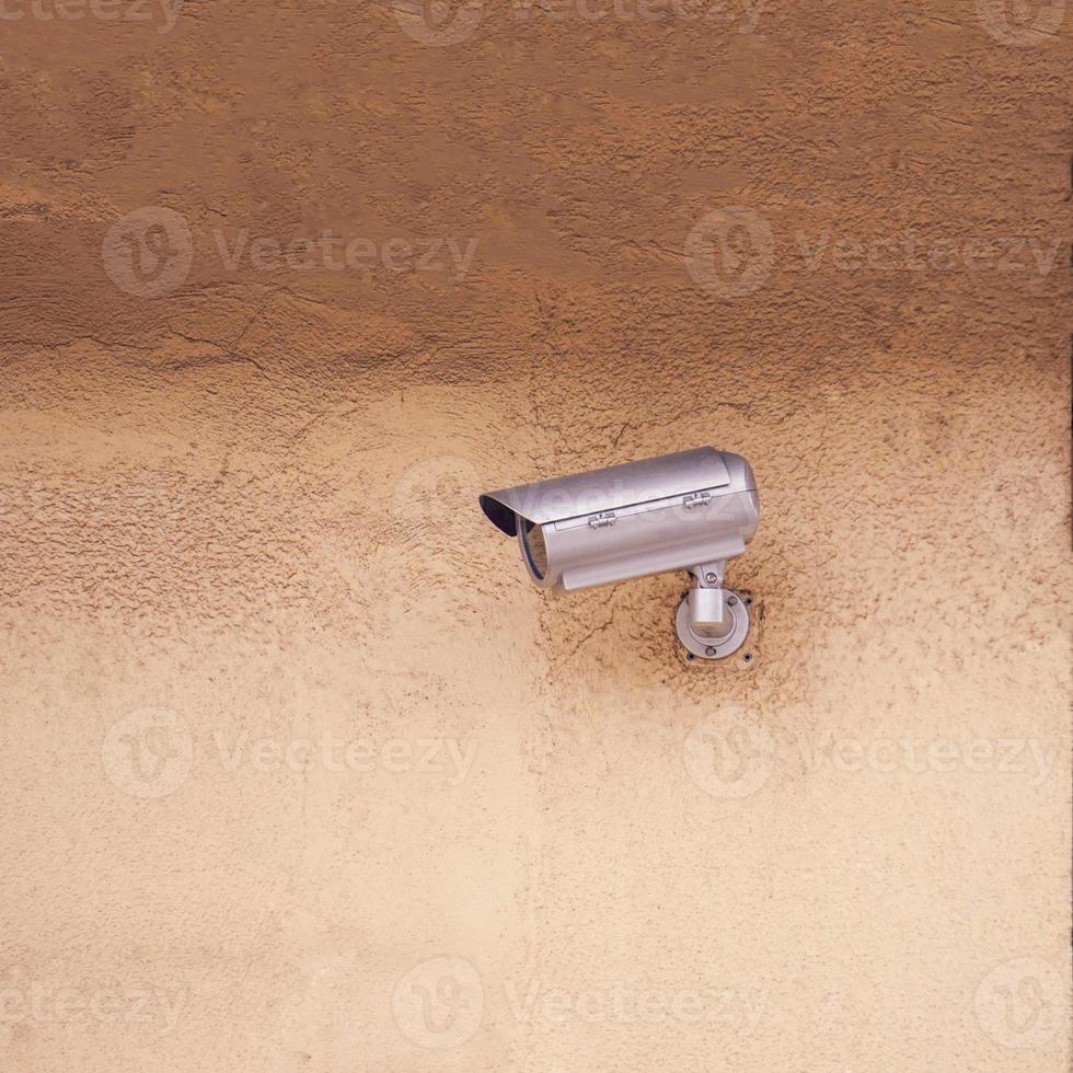 security camera on the building wall photo