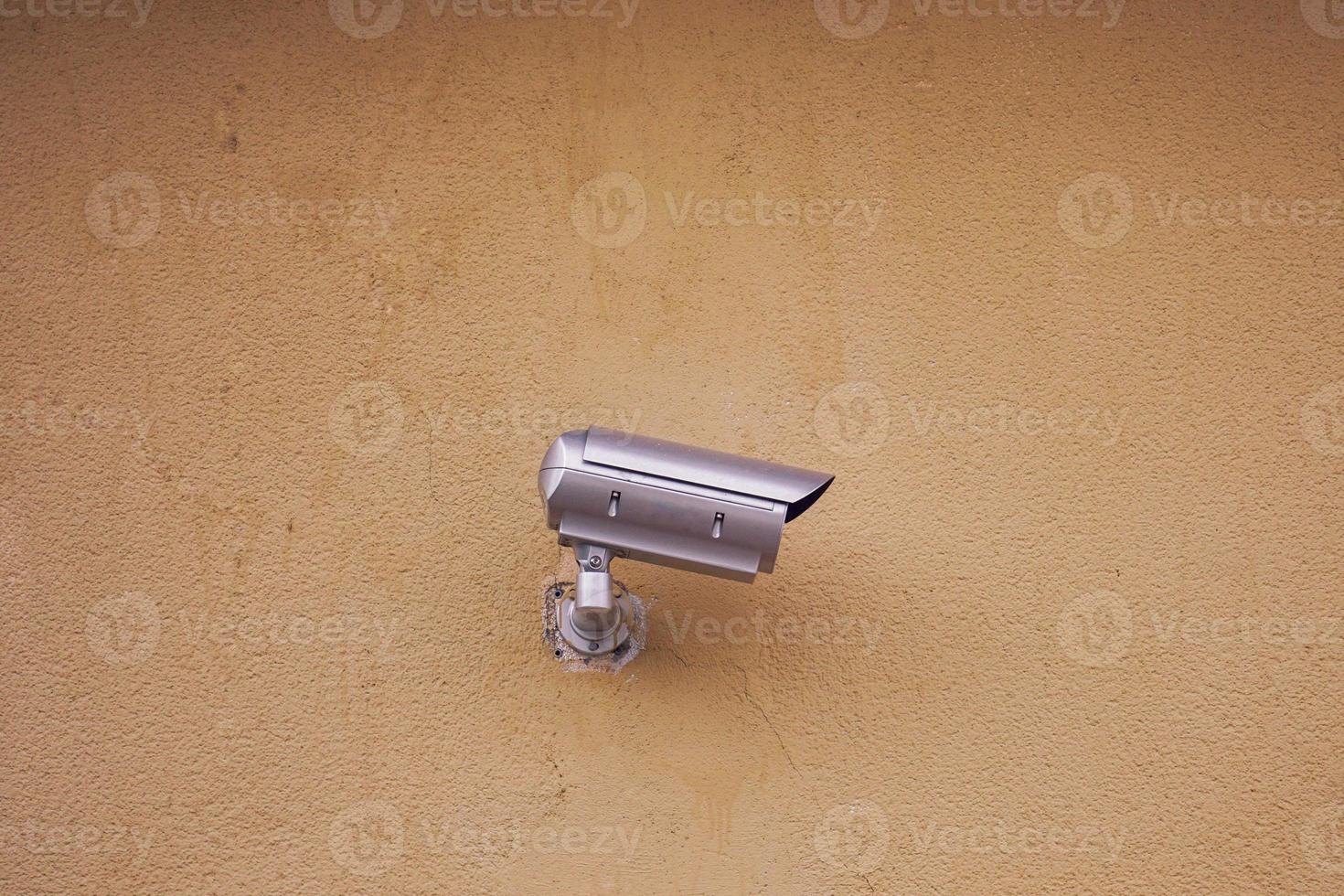 security camera on the building wall photo
