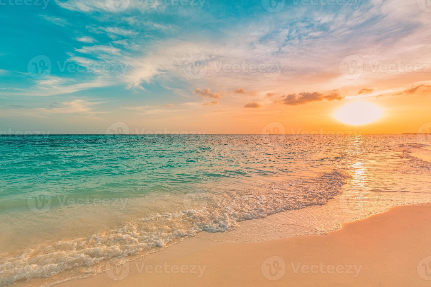 Sea ocean beach sunset sunrise landscape outdoor. Water wave with white foam. Beautiful sunset colorful sky with clouds. Natural island, sun rays seascape, dream nature. Inspirational shore, coast photo