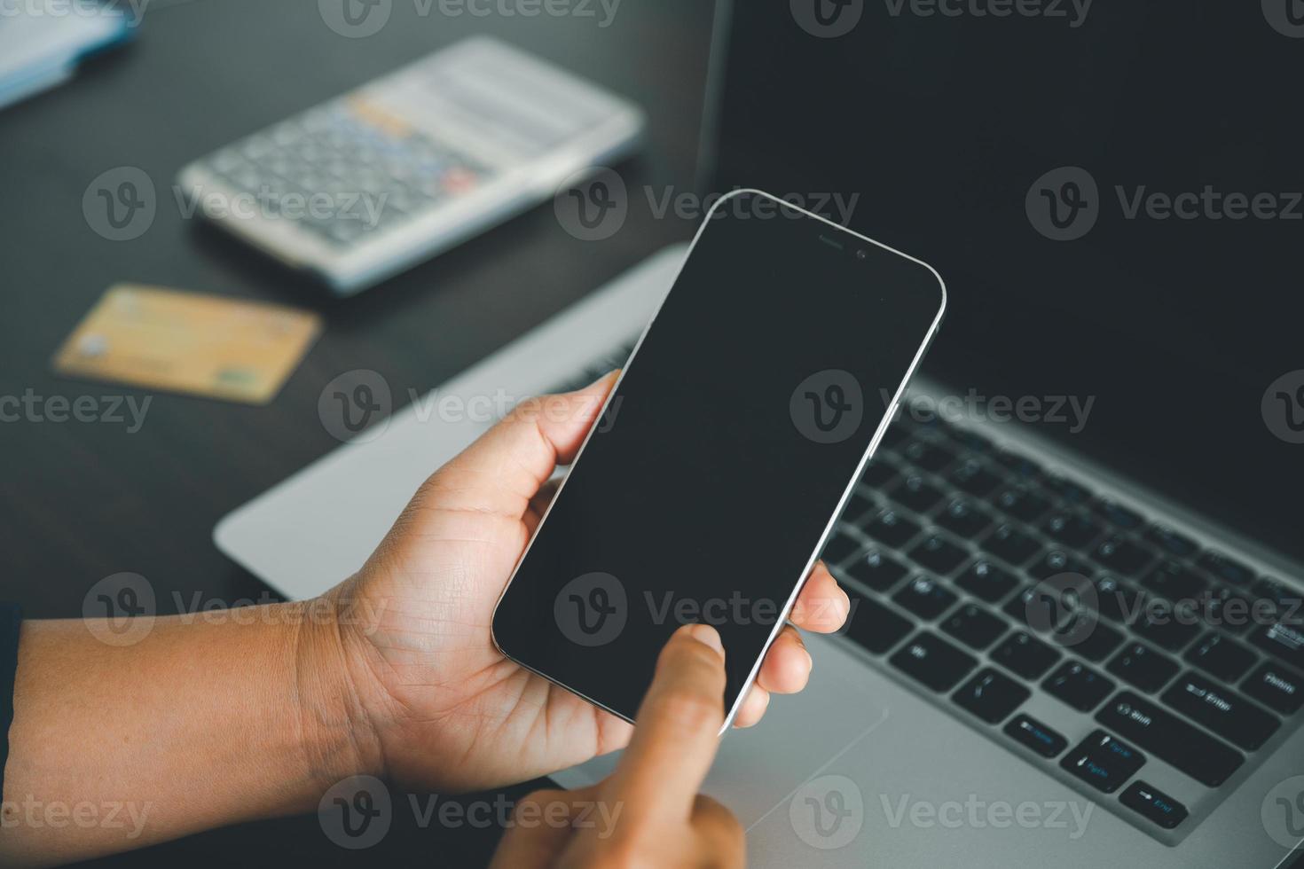 Woman hands of using online virtual app on mobile phone. Millennial guy chatting on smartphone, using banking services, reading text message, typing, shopping, making call, browsing internet.Close up photo
