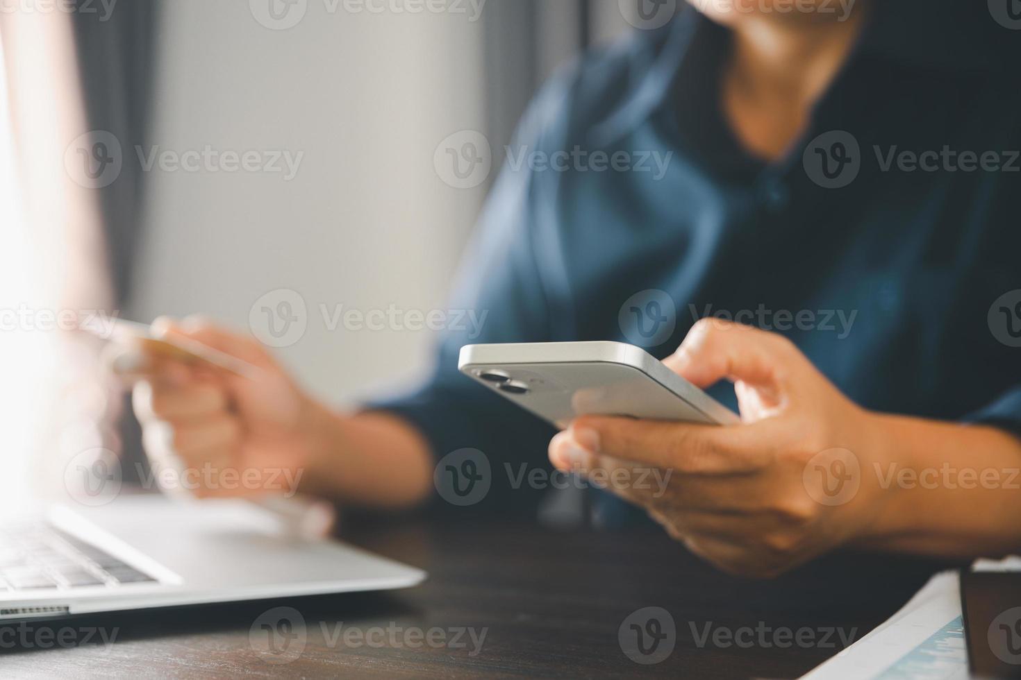 Woman hands of using online virtual app on mobile phone. Millennial guy chatting on smartphone, using banking services, reading text message, typing, shopping, making call, browsing internet.Close up photo