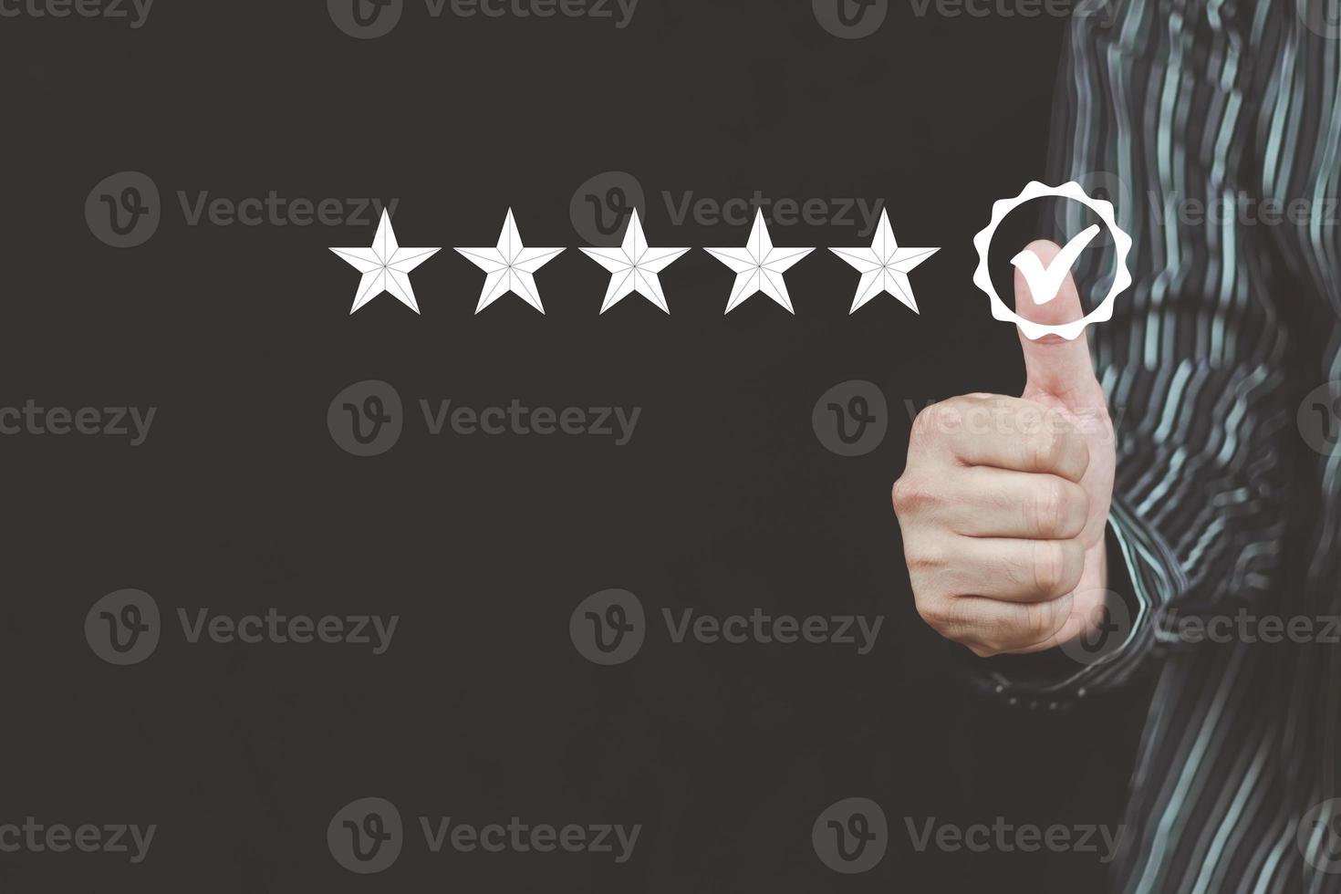 Customer service and Satisfaction concept Men's hands doing online assessments in the satisfaction rating the popular service company allows customers in order to improve and develop the organization photo