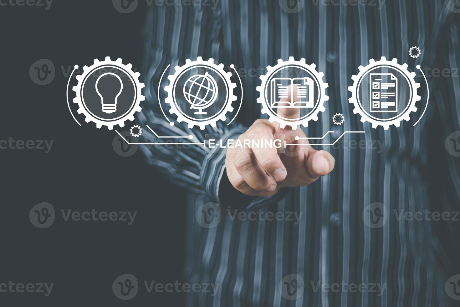 e-learning and education concept, woman's hand using a smartphone, showing icons, learning through a technological medium or online. that reduces the constraints on time and place of study photo