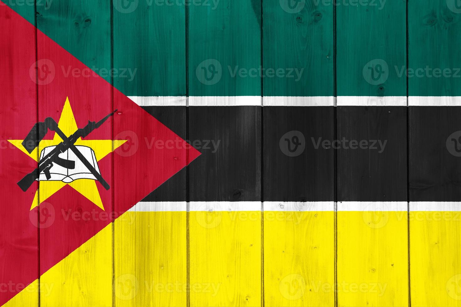 Flag of Mozambique on a textured background. Concept collage. photo