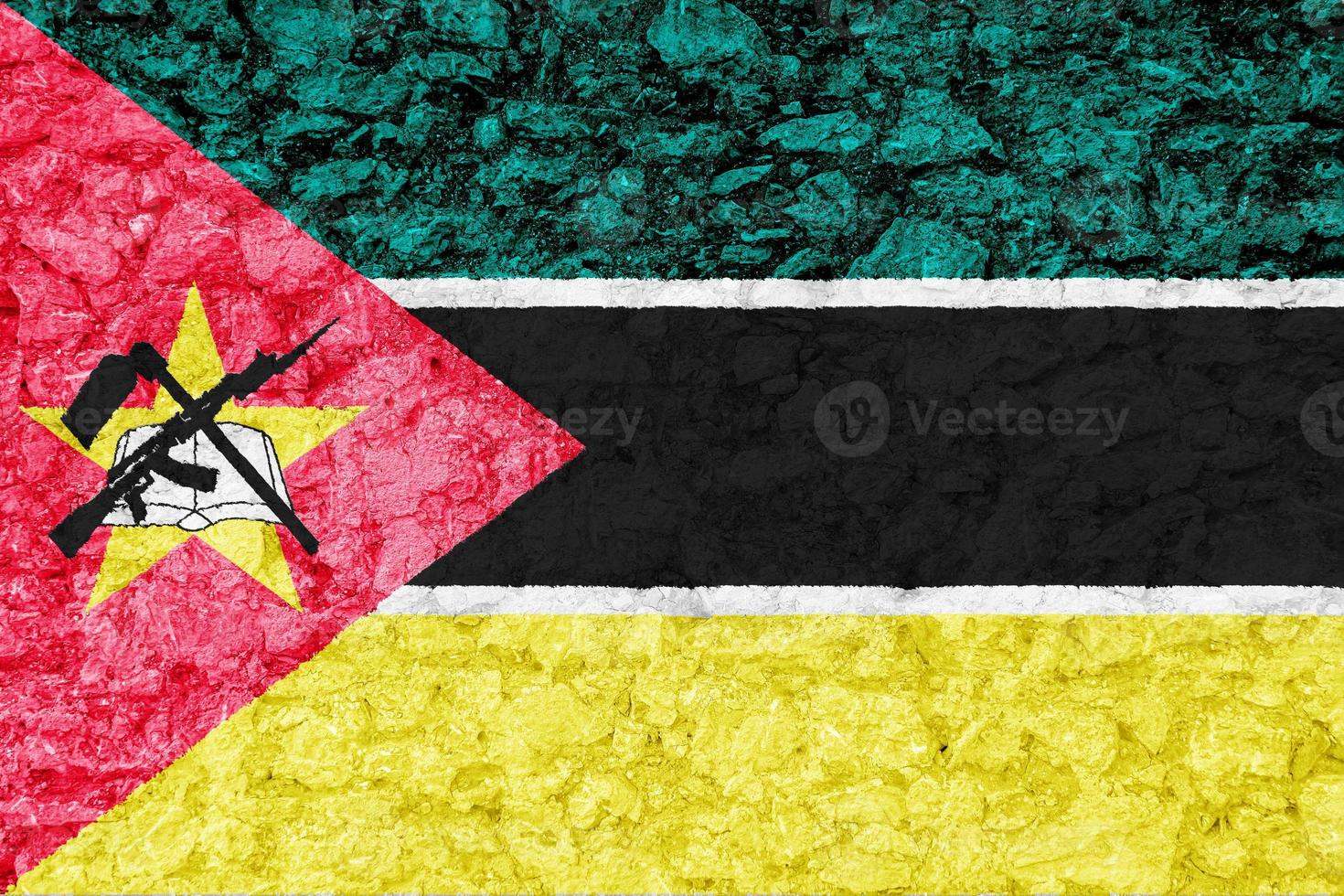 Flag of Mozambique on a textured background. Concept collage. photo