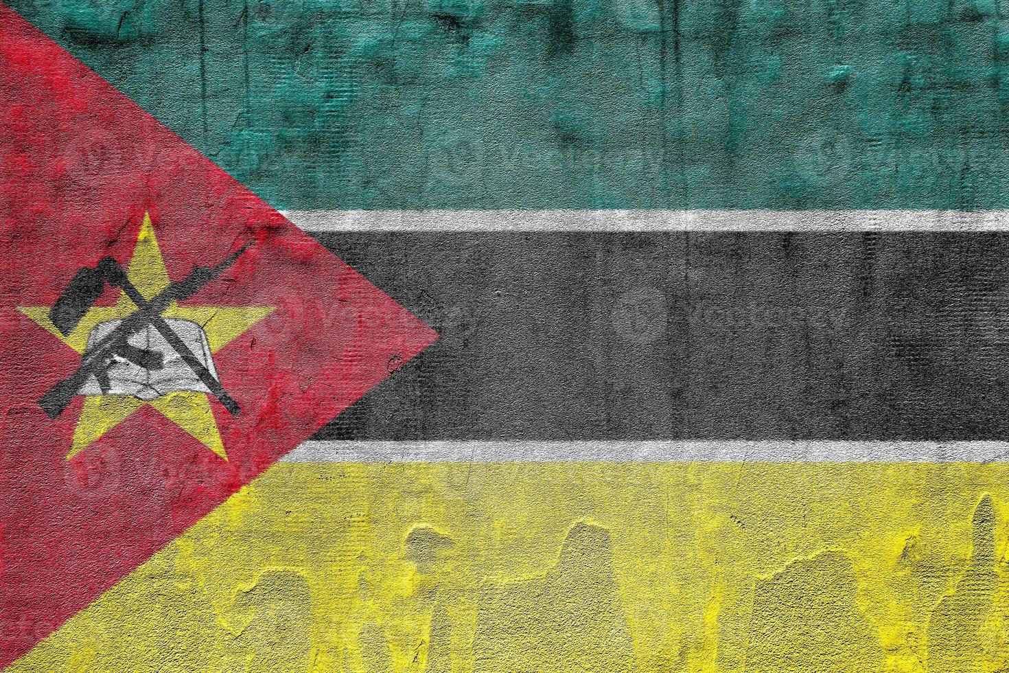 Flag of Mozambique on a textured background. Concept collage. photo