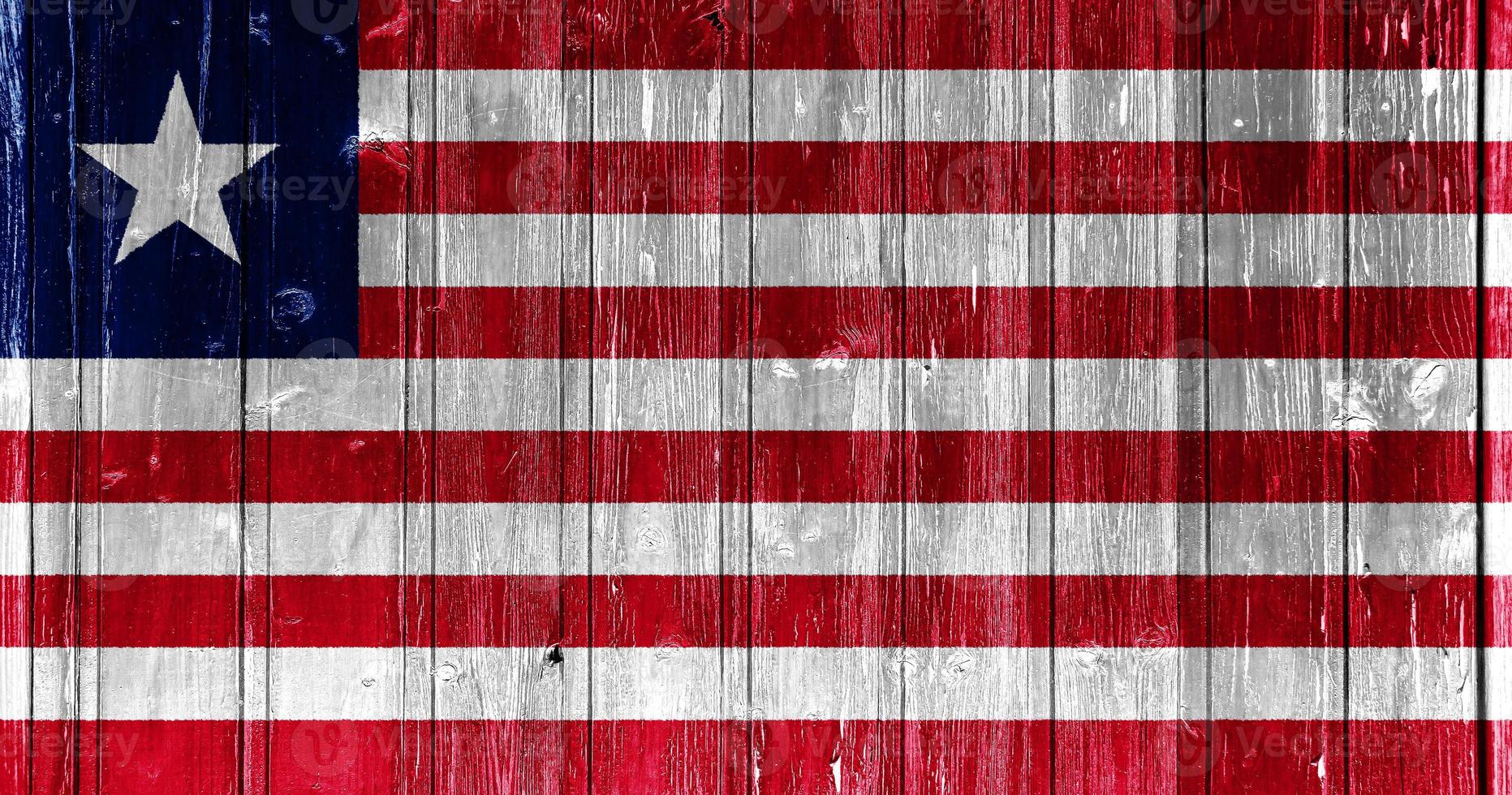 Flag of Liberia on a textured background. Concept collage. photo