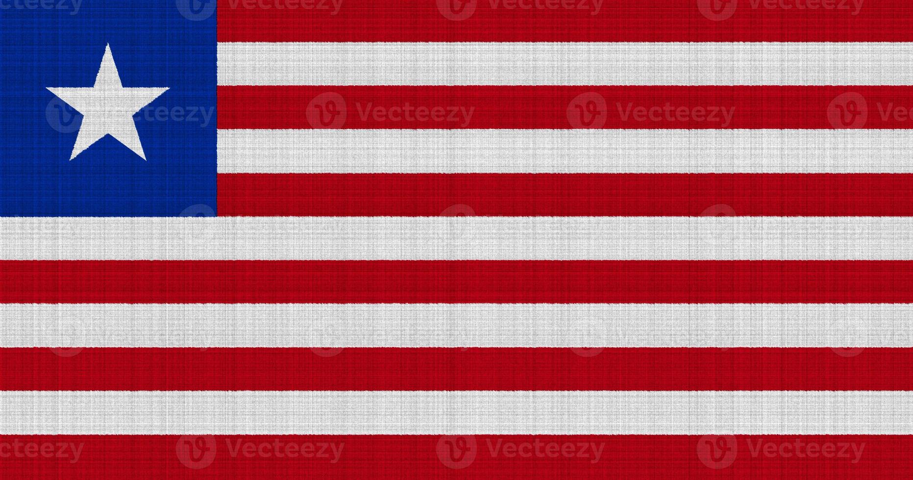 bandera de liberia sobre un fondo texturizado. collage de conceptos foto