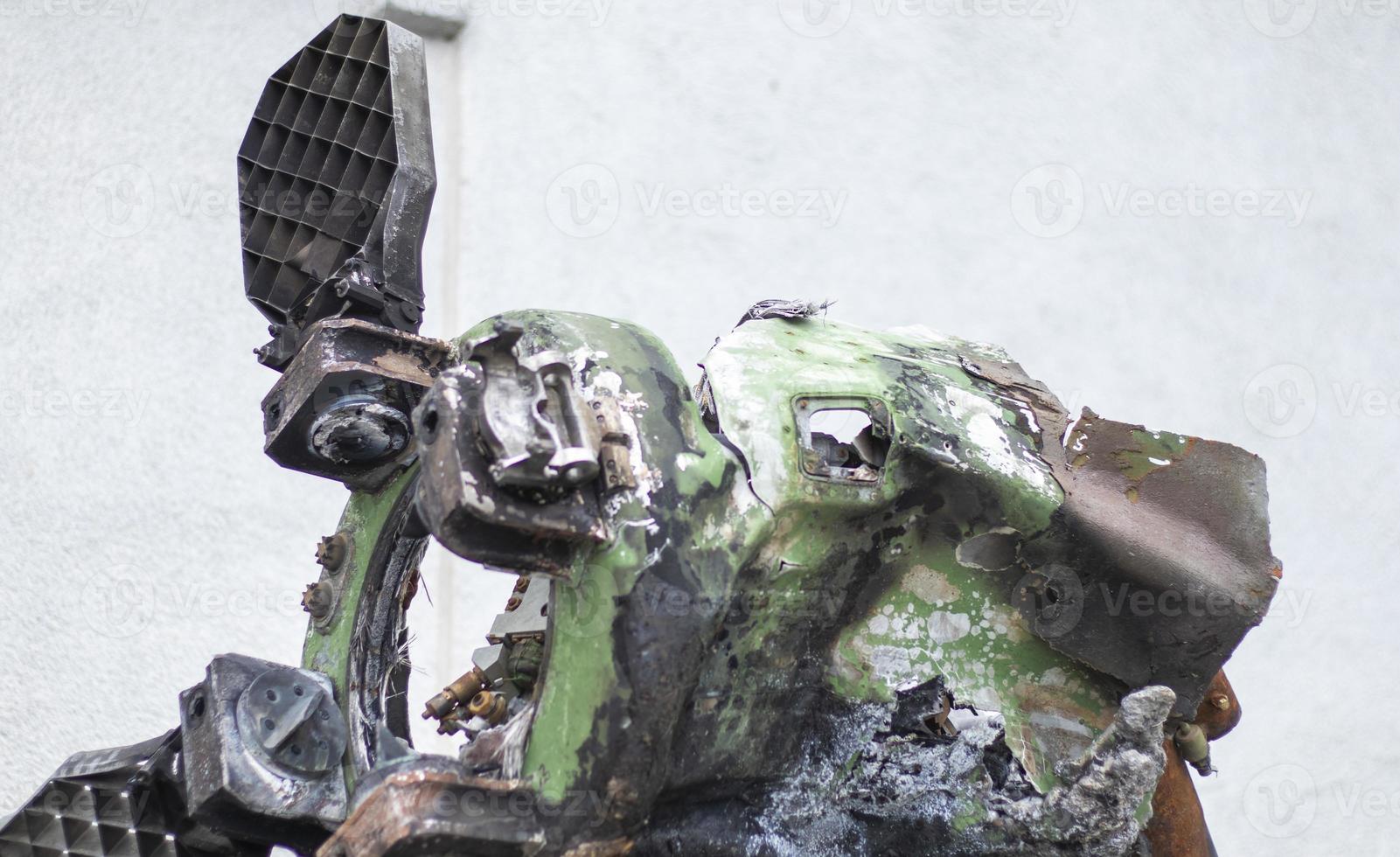 Remains of missile units of the operational-tactical missile system Tochka-U, 9M79M. The air defense system shot down a missile, part of it fell near the house. Soviet tactical bomb on the street. photo