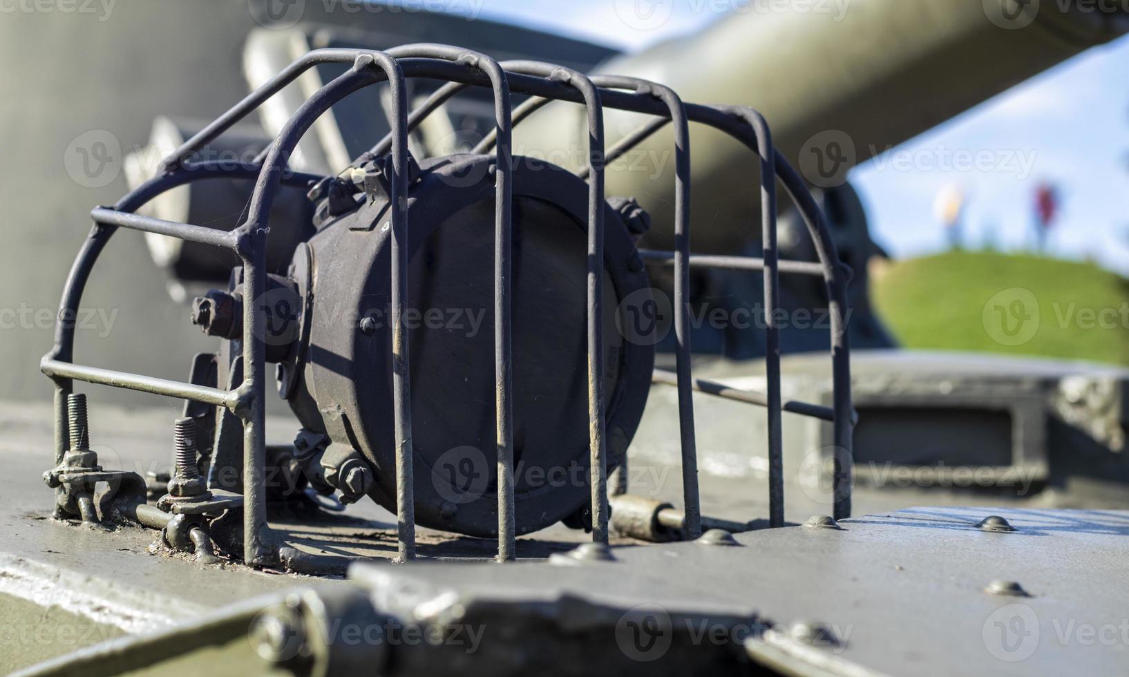 Protection elements of the military light amphibious tank PT-76. Lantern for lighting with protection on a Soviet tank, object 740. Lantern of an infantry fighting vehicle. Tank lights. photo