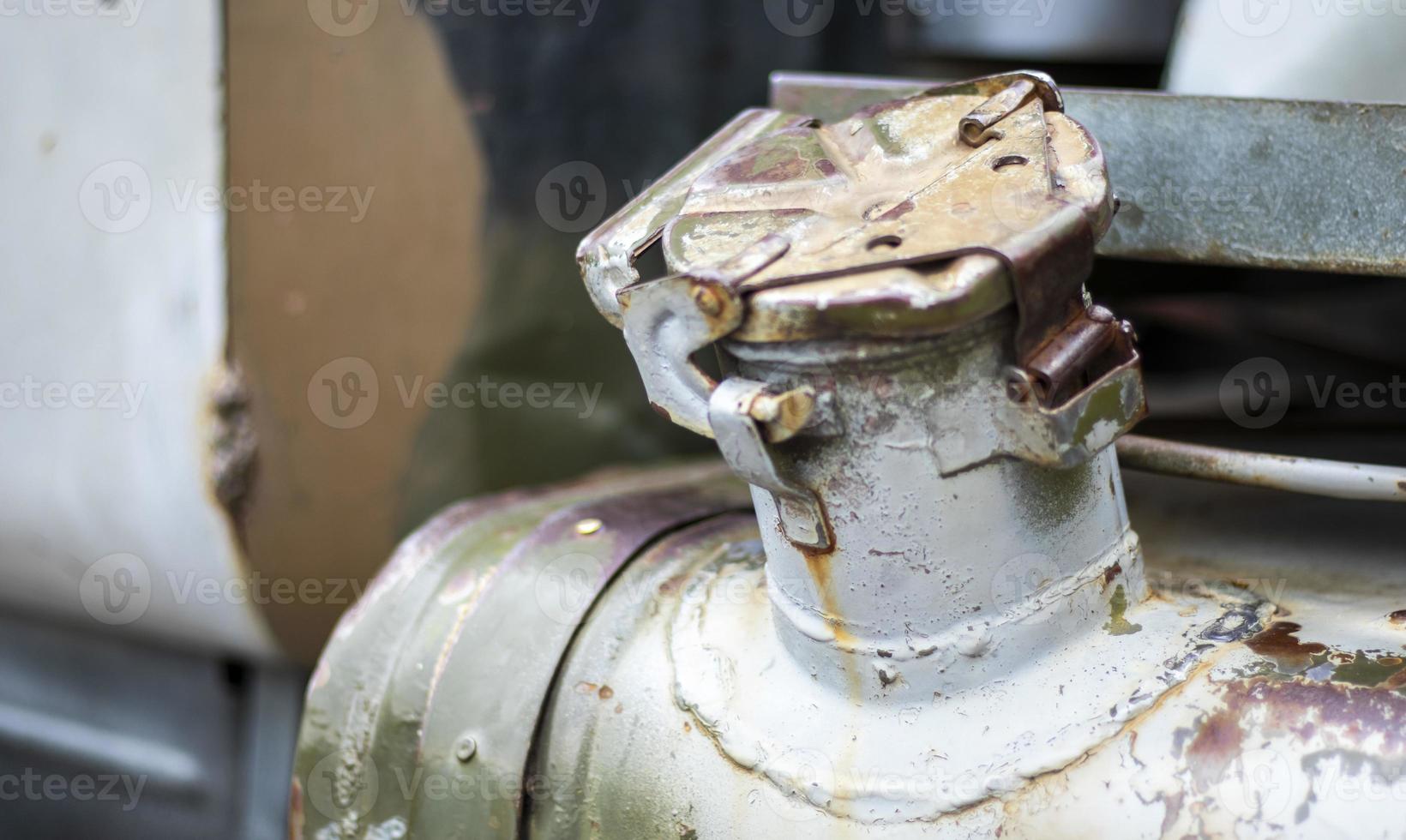 Large old truck, closeup view of the fuel tank on the left. Gas tank
