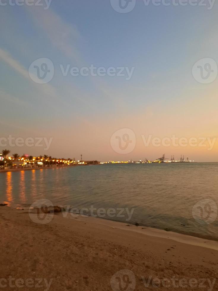Evening view and sunset from Jeddah beach is very beautiful.  Crowds of people flock to Jeddah Beach to watch the sunset. photo