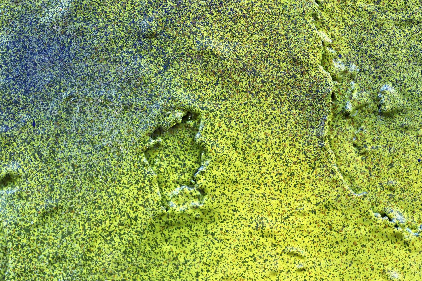 Texture of colorful graffiti paint on conrete and brick walls in red blue purple and silver photo