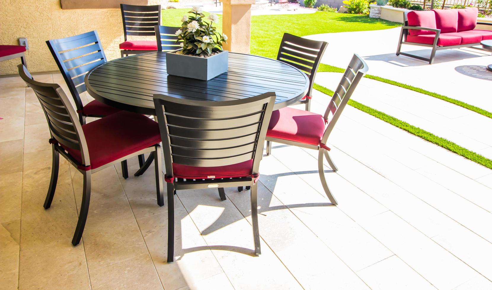 Rear Yard Patio Furniture With Round Table And Chairs With Cushions photo