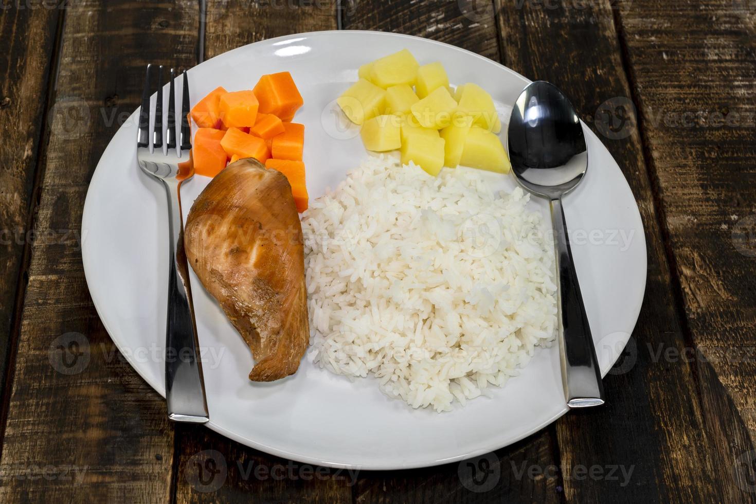 Rice dish with fried chicken breast 13959548 Stock Photo at Vecteezy