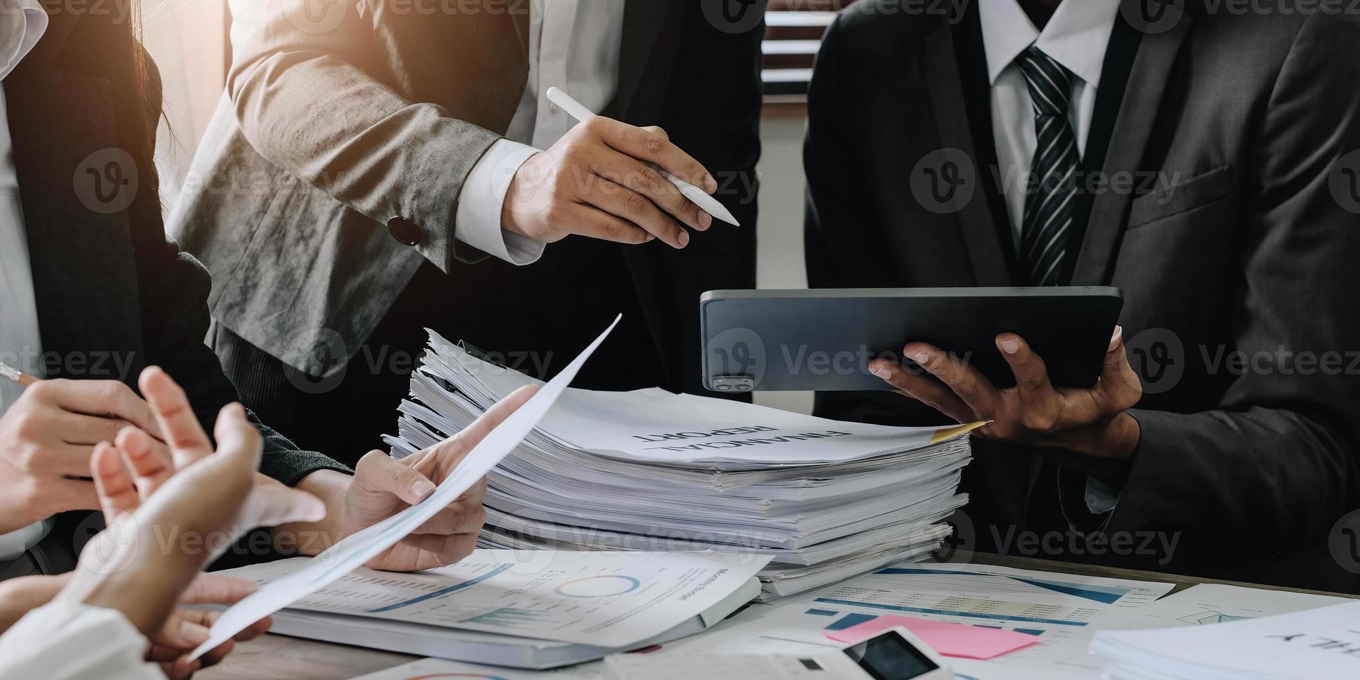 Asian business adviser meeting to analyze and discuss the situation on the financial report in the meeting room.Investment Consultant, Financial advisor and accounting concept photo