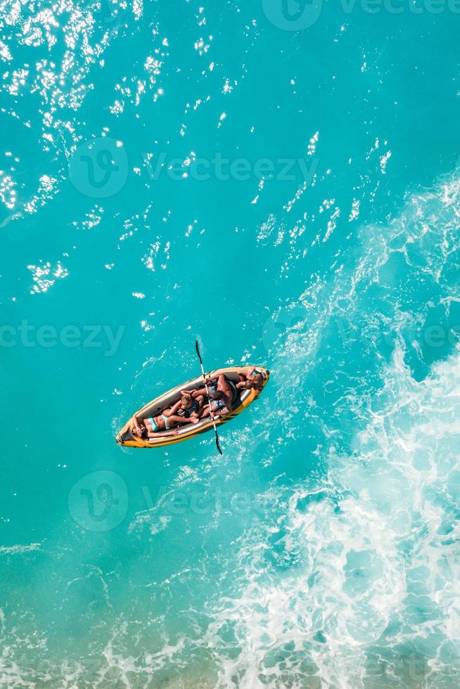 Aerial View Of A Happy Family In A Kayak photo