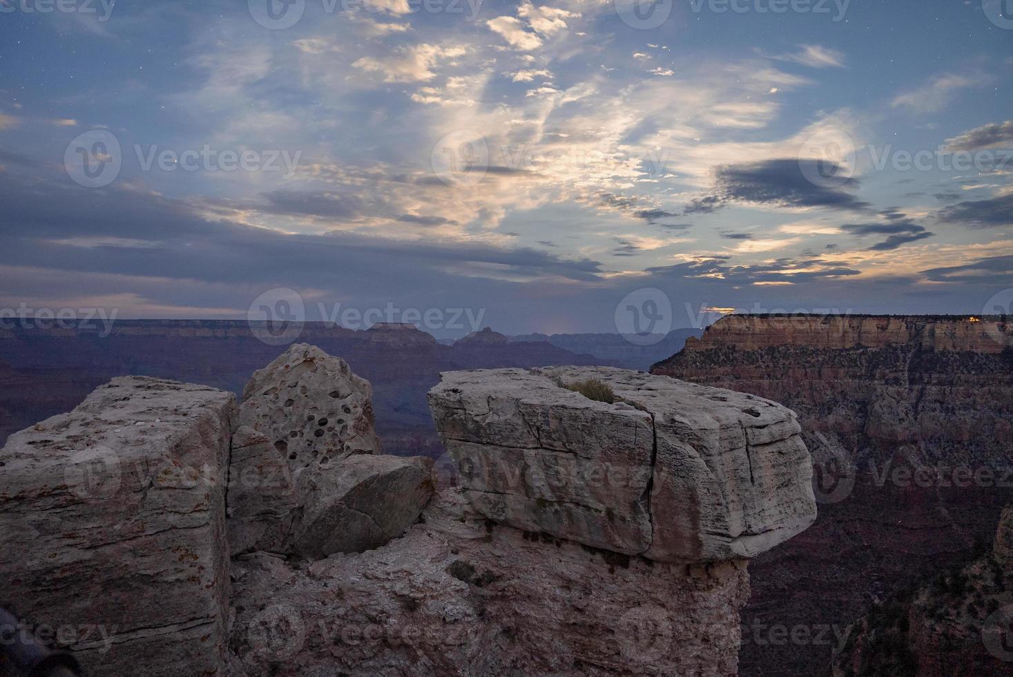 Tranquil View Of Rock Formations On Mountain under cloudy Sky photo