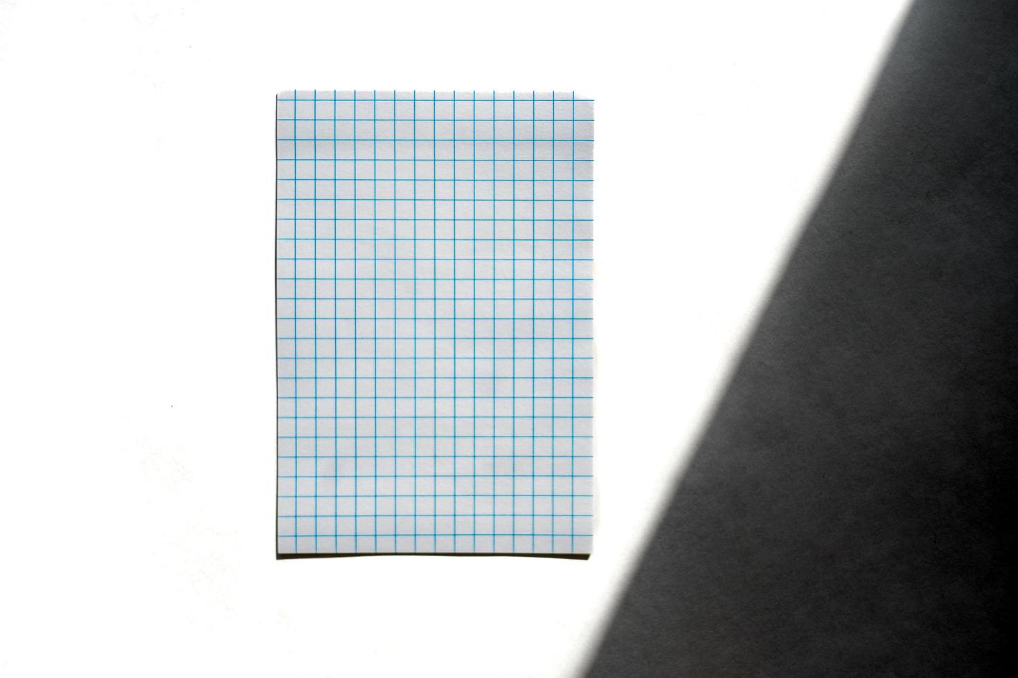 Graph paper on white photo