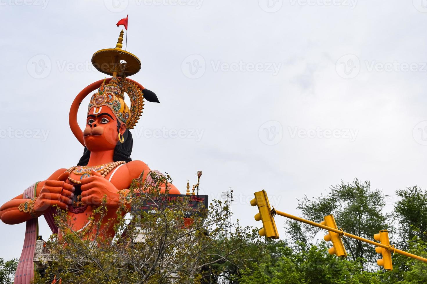 Big statue of Lord Hanuman near the delhi metro bridge situated near Karol Bagh, Delhi, India, Lord Hanuman big statue touching sky photo