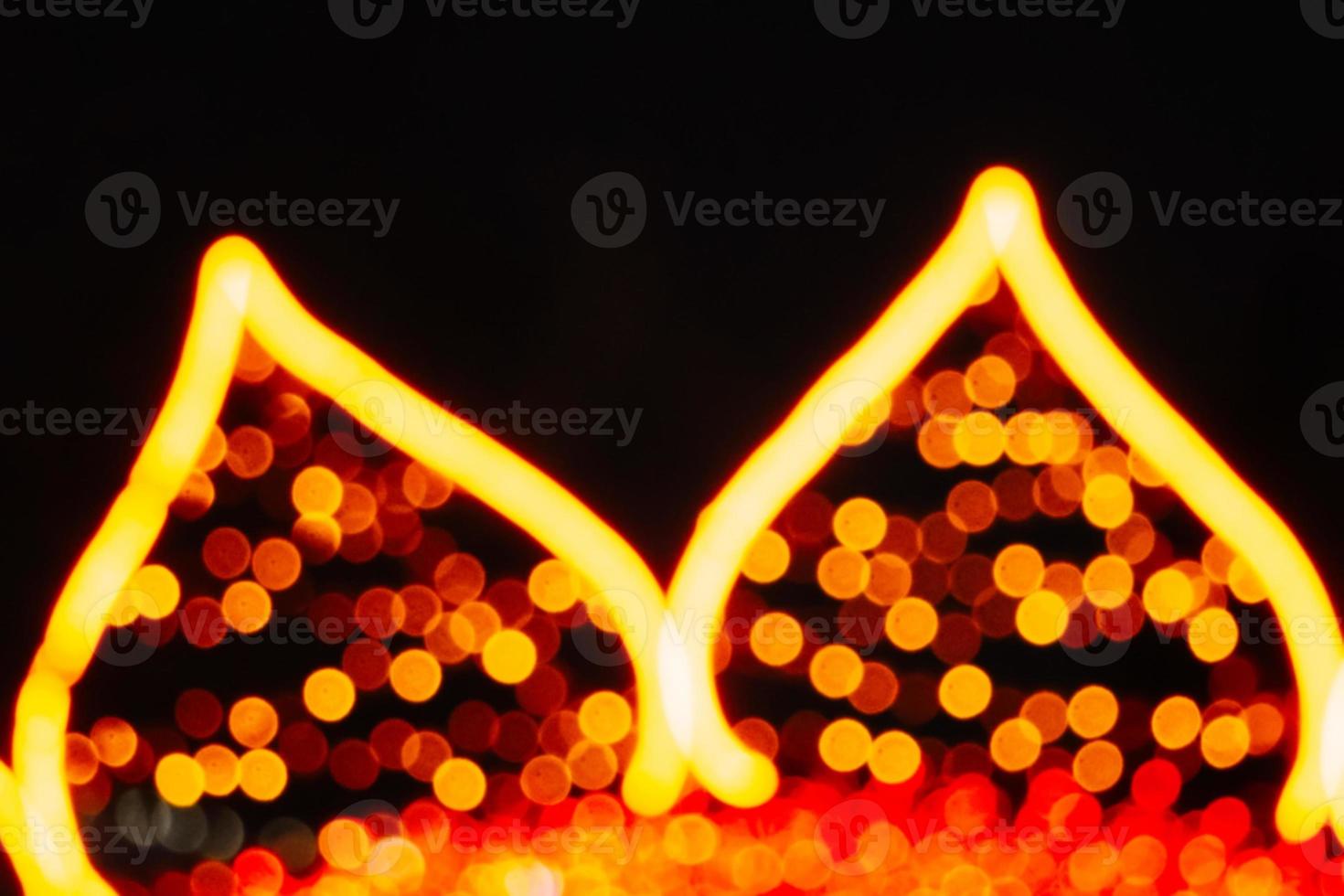 Christmas defocus lights, festive decor elements. City illumination. photo