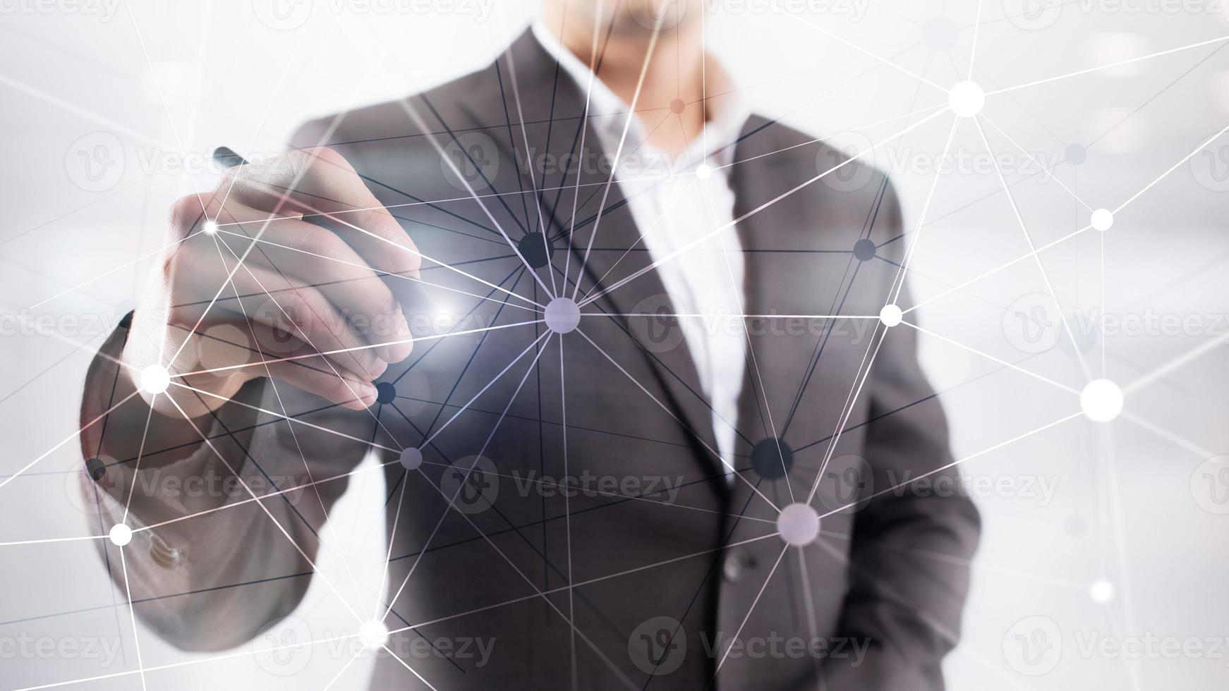 Blockchain network on blurred skyscrapers background. Financial technology and communication concept. photo