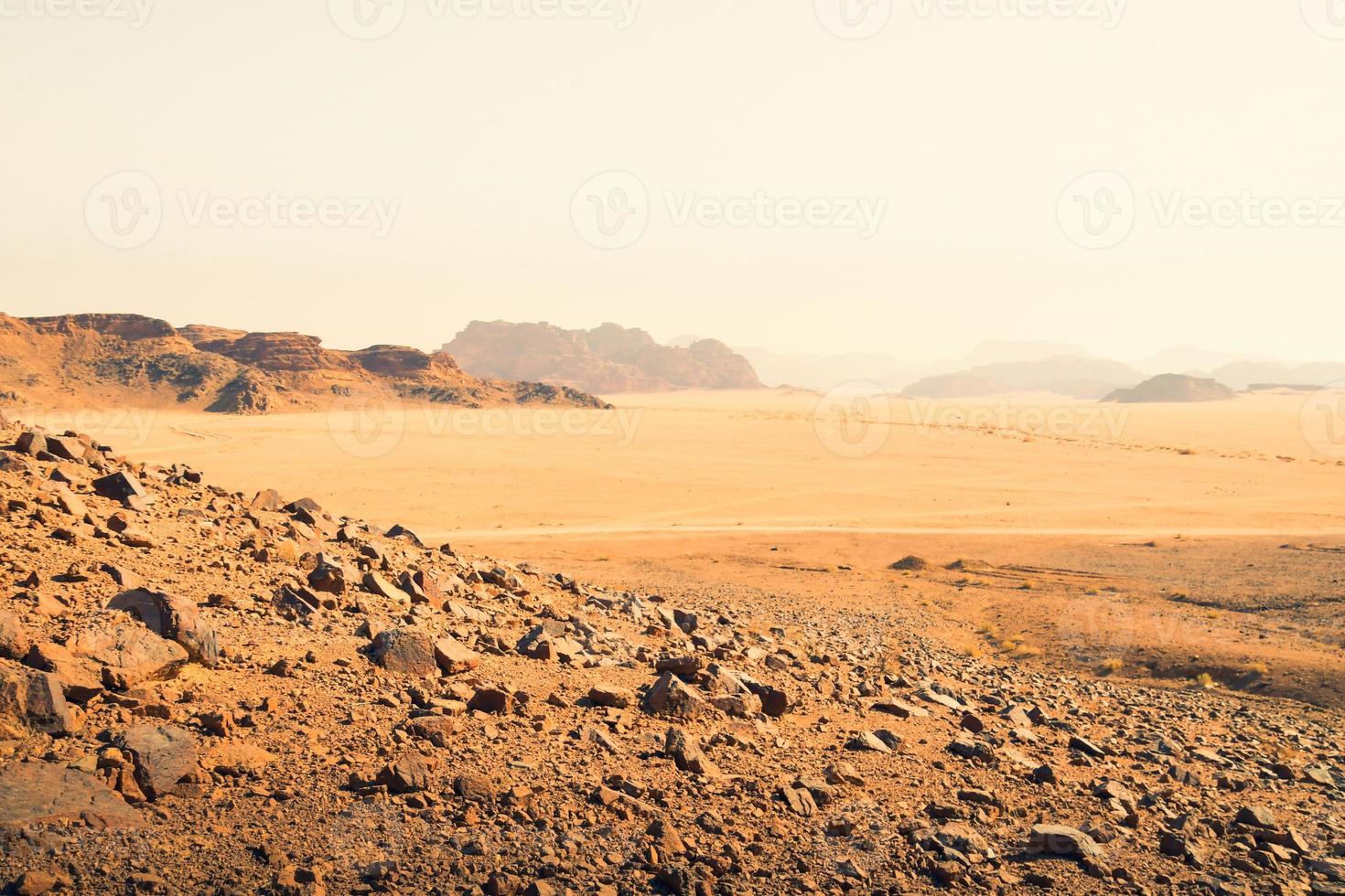 Planet Mars like landscape - Photo of Wadi Rum desert in Jordan with red pink sky above, this location was used as set for many science fiction movies