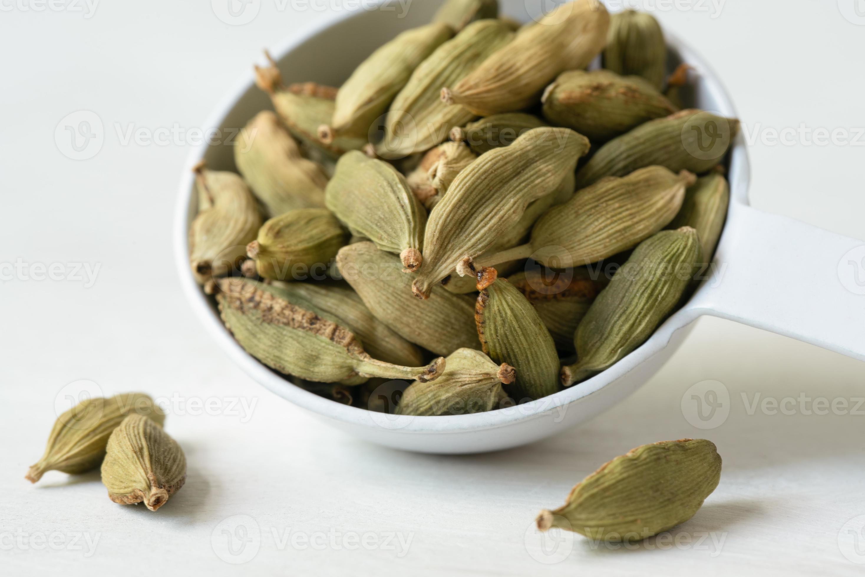 Green Cardamom Pods Spilled From a Teaspoon 13970508 Stock Photo at