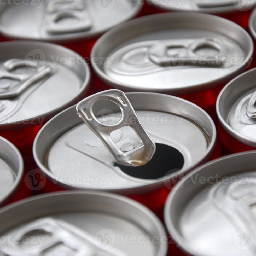 Many aluminium soda drink cans. Advertising for Soda drinks or tin cans mass manufacturing photo