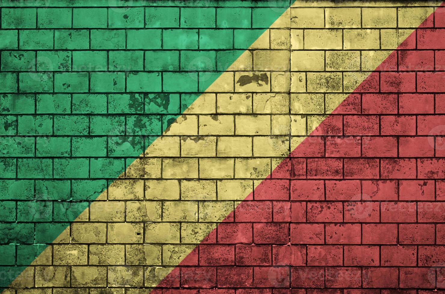 Congo flag is painted onto an old brick wall photo