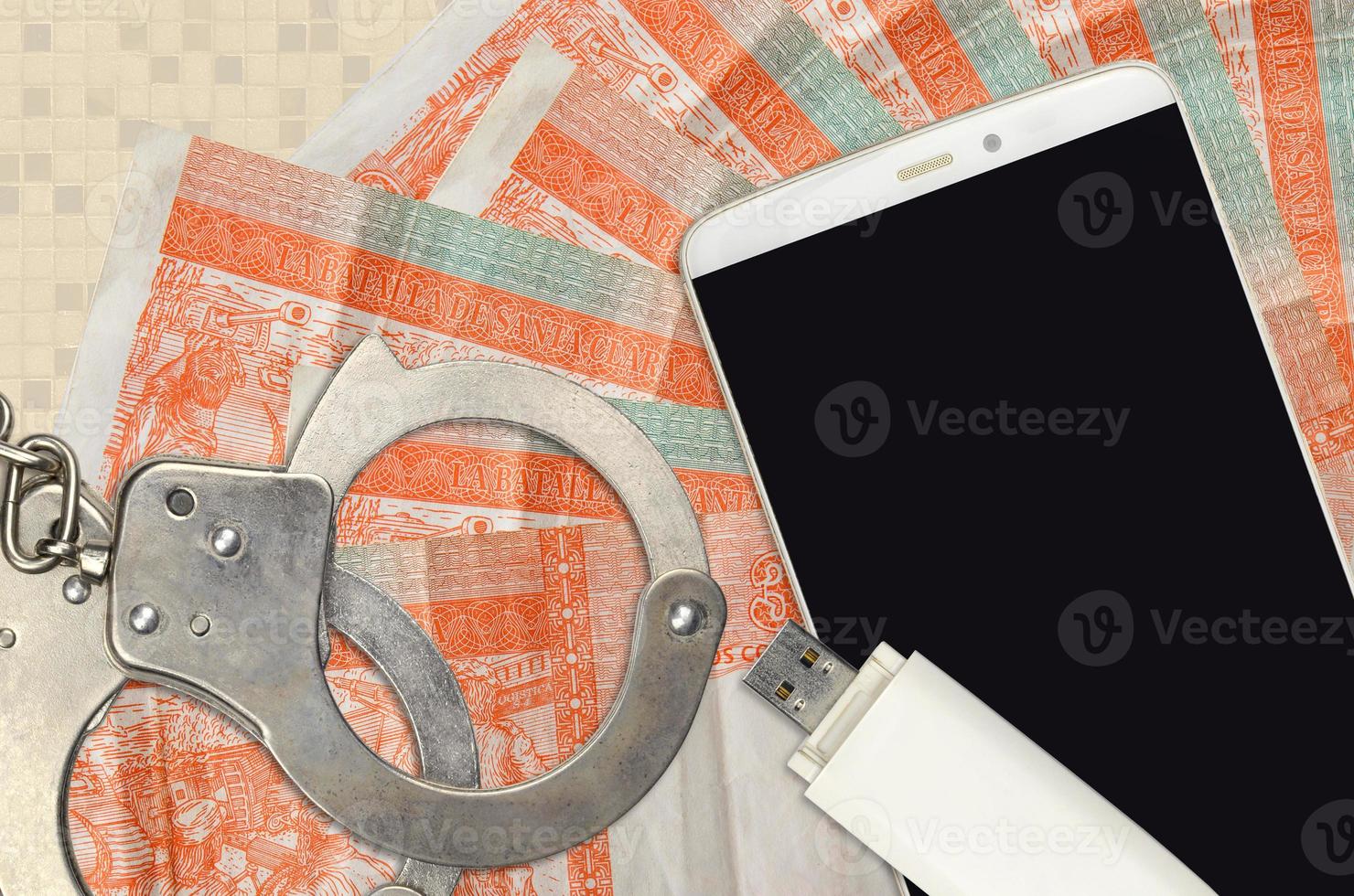 3 cuban pesos convertibles bills and smartphone with police handcuffs. Concept of hackers phishing attacks, illegal scam or malware soft distribution photo