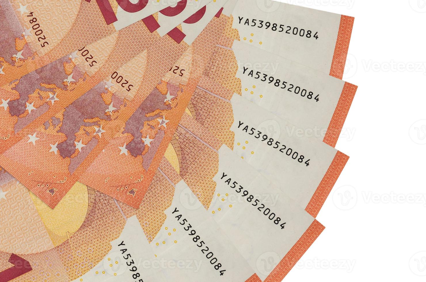 10 euro bills lies isolated on white background with copy space stacked in fan shape close up photo