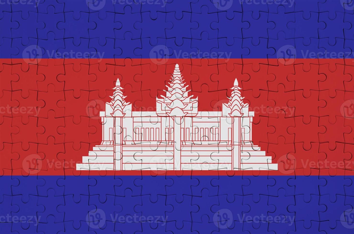 Cambodia flag is depicted on a folded puzzle photo