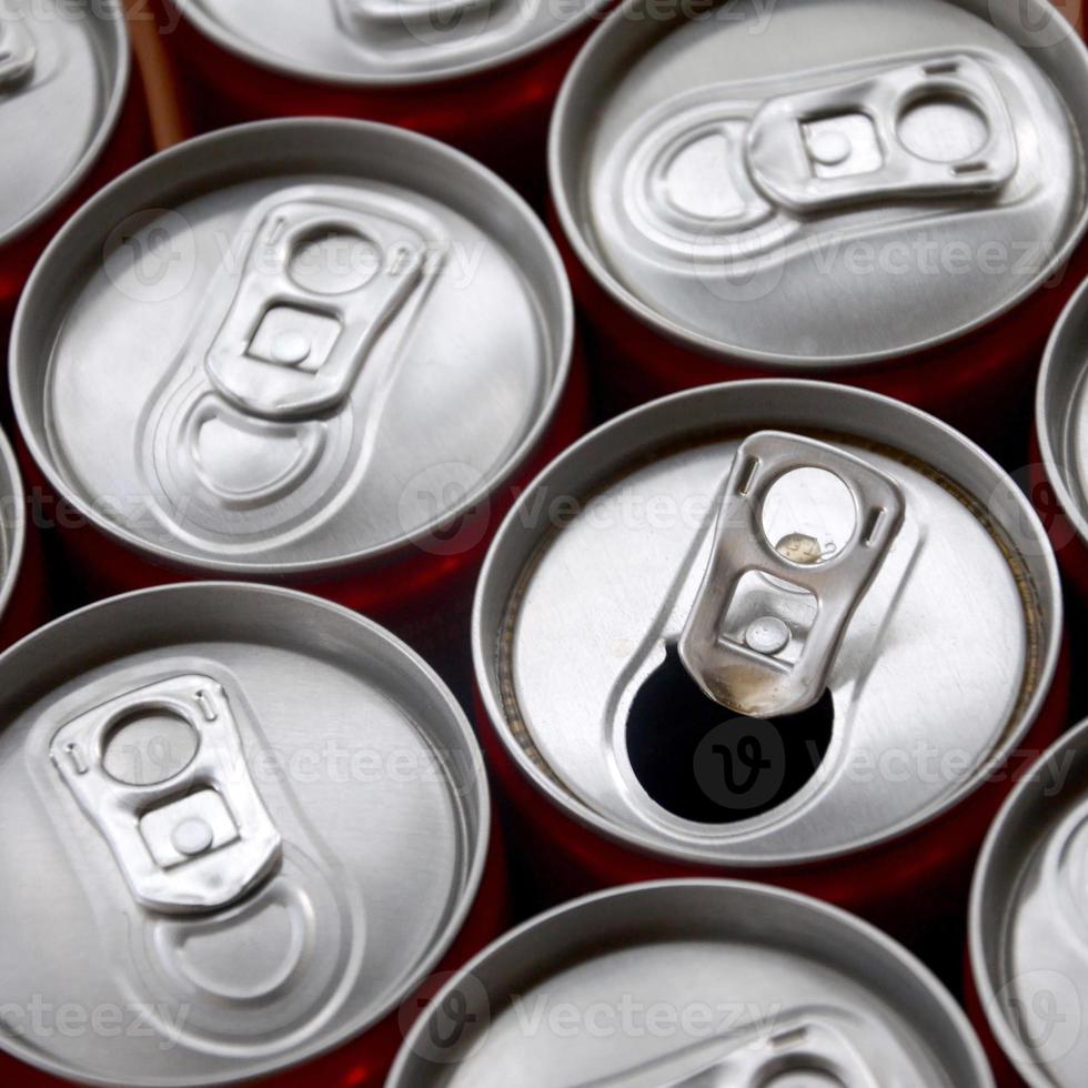 Many aluminium soda drink cans. Advertising for Soda drinks or tin cans mass manufacturing photo