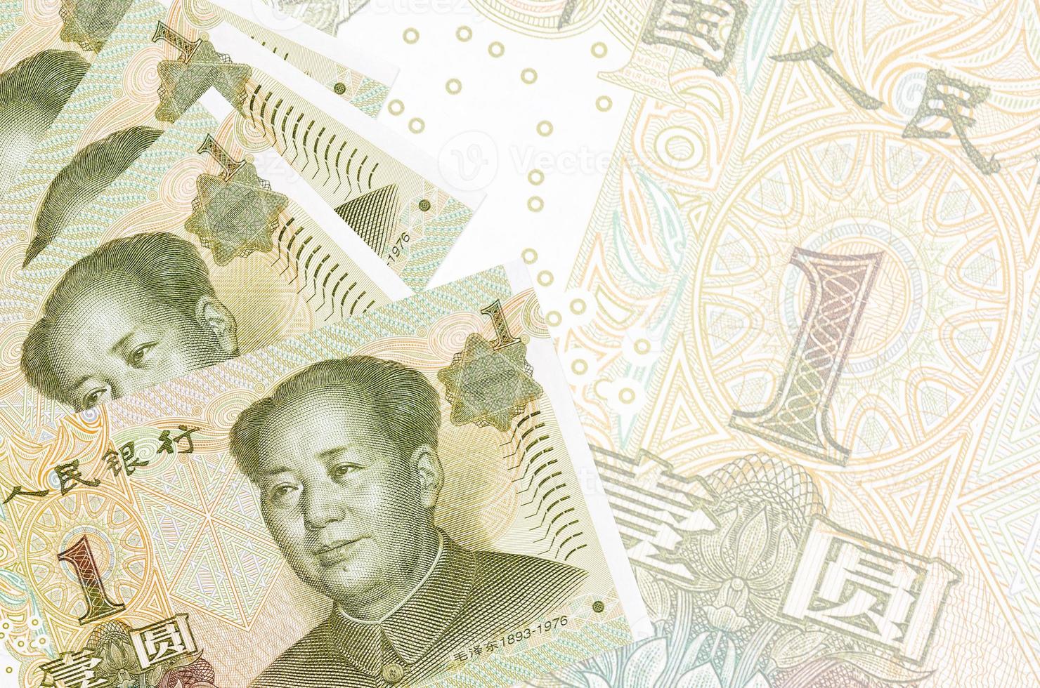 1 Chinese yuan bills lies in stack on background of big semi-transparent banknote. Abstract business background photo