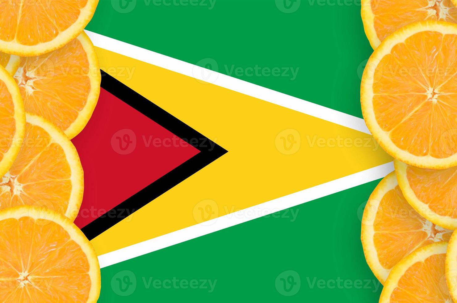 Guyana flag in citrus fruit slices vertical frame photo