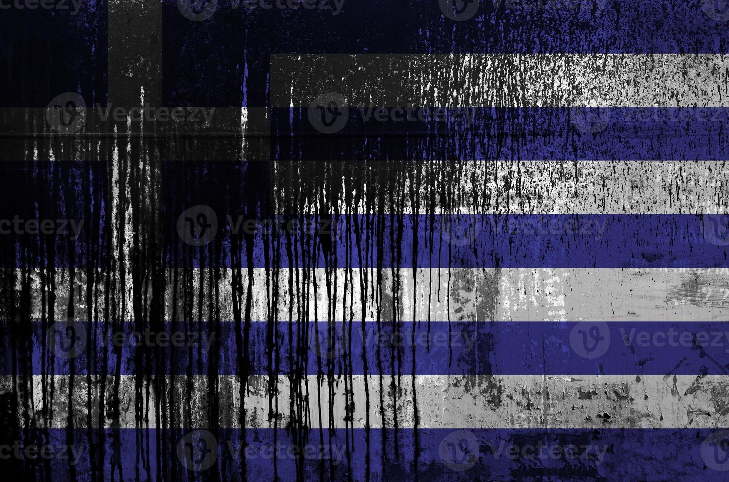 Greece flag depicted in paint colors on old and dirty oil barrel wall closeup. Textured banner on rough background photo