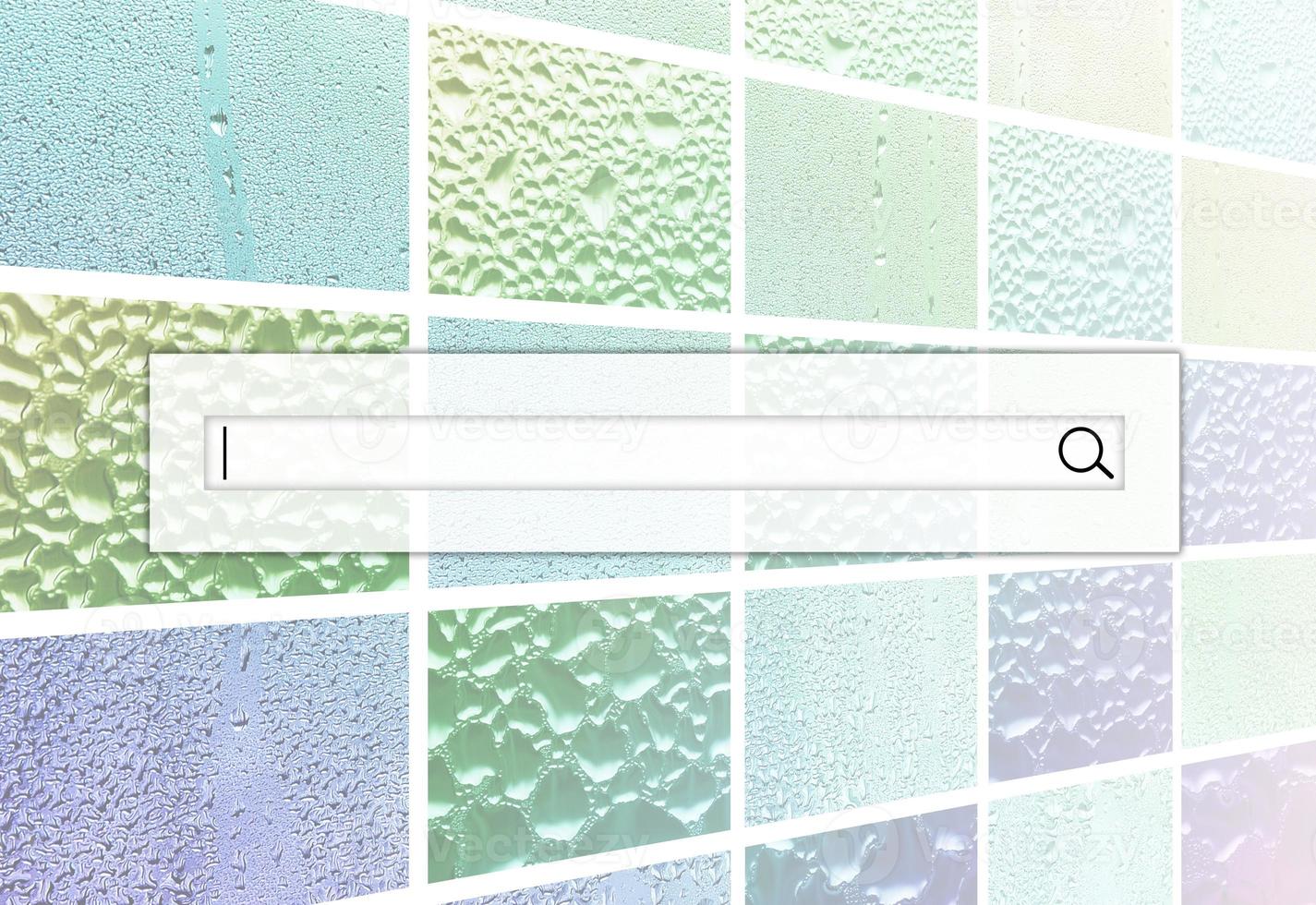 The search field is located on top of collage of many different fragments of glass, decorated with rain drops from the condensate. Rainbow colors photo