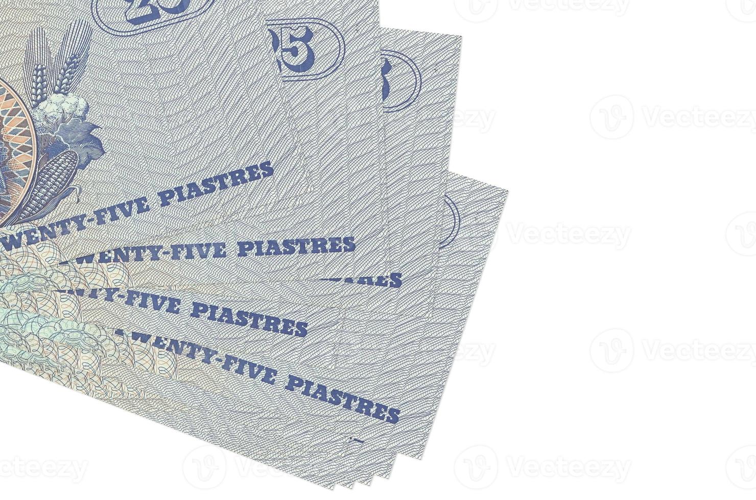 25 Egyptian piastres bills lies in small bunch or pack isolated on white. Mockup with copy space. Business and currency exchange photo