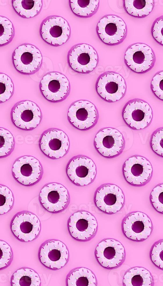 Many small plastic donuts lies on a pastel colorful background. Flat lay minimal pattern. Top view photo