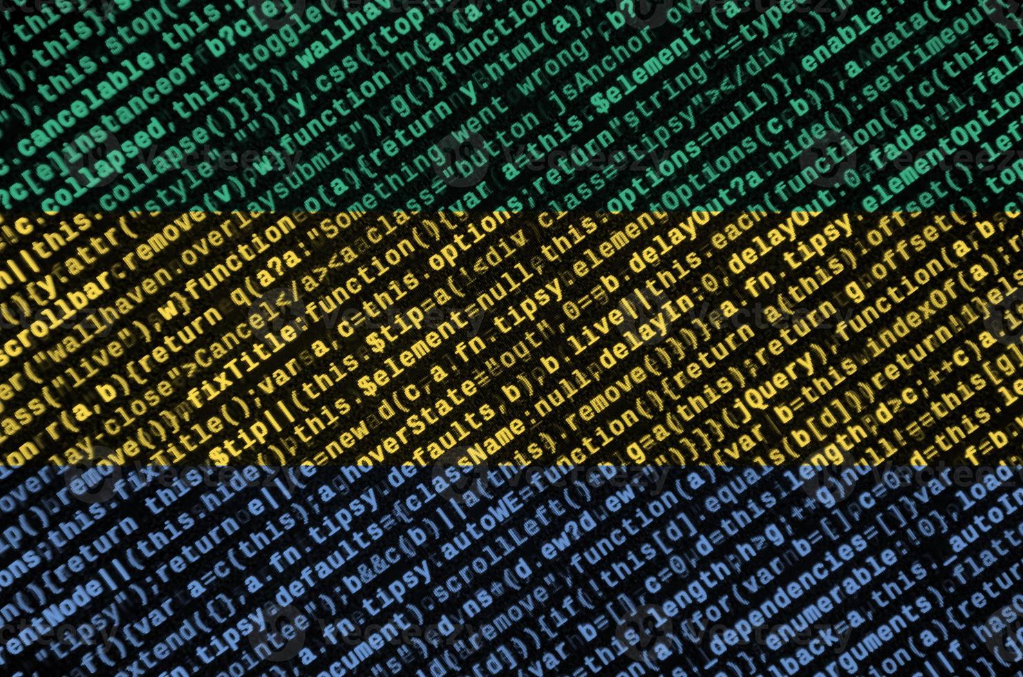 Gabon flag is depicted on the screen with the program code. The concept of modern technology and site development photo