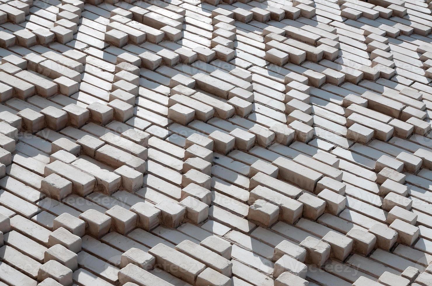 A pattern made of white bricks in the form of diamond shapes. Decoration of the walls during the Soviet Union photo