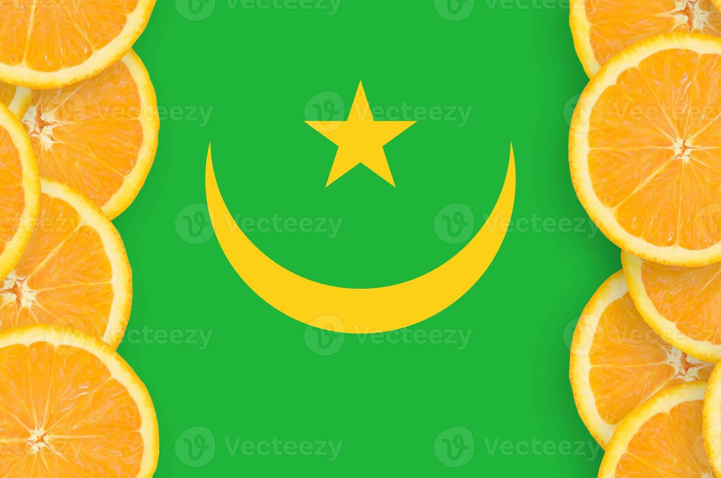Mauritania flag in citrus fruit slices vertical frame photo