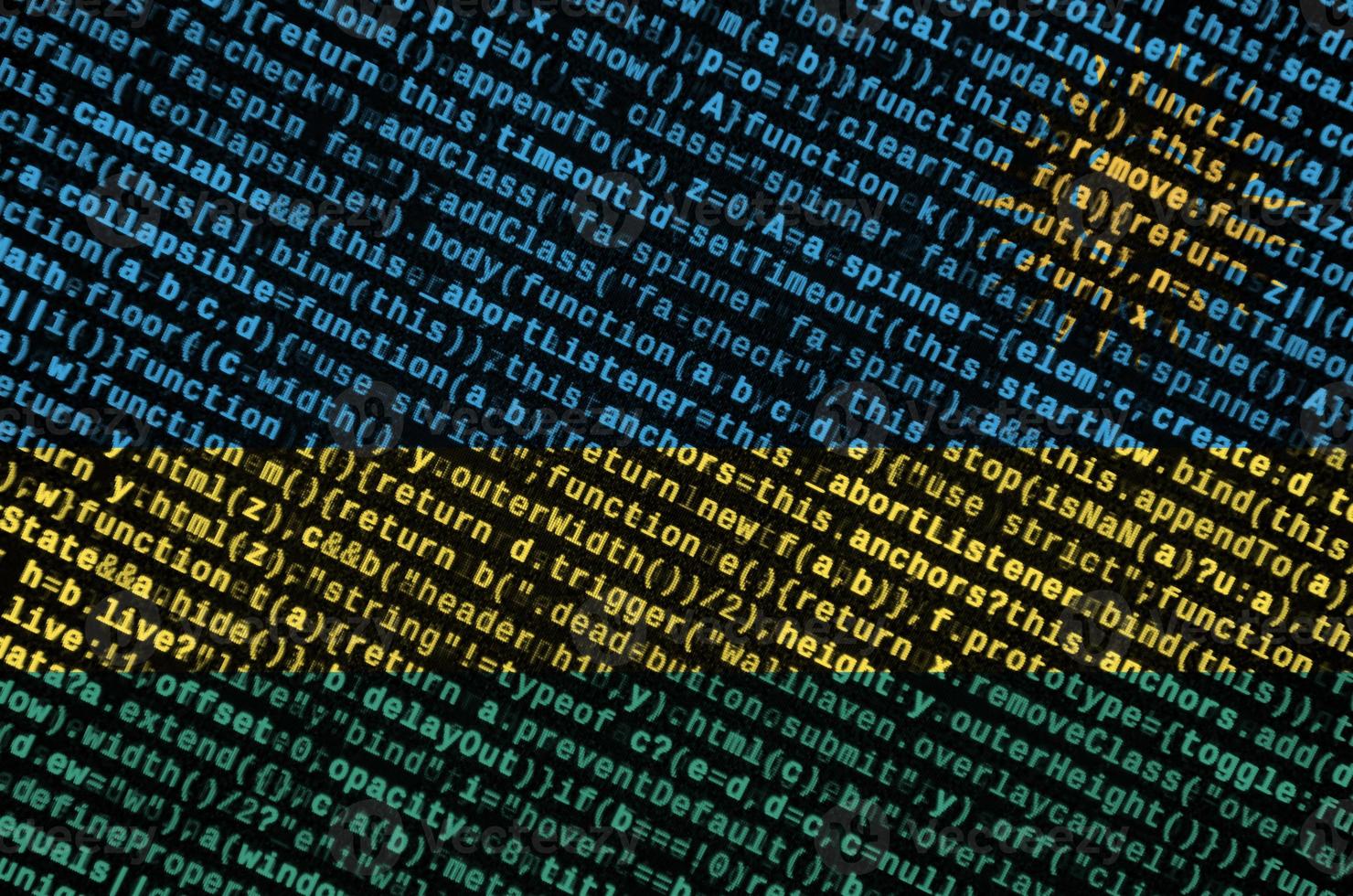Rwanda flag is depicted on the screen with the program code. The concept of modern technology and site development photo