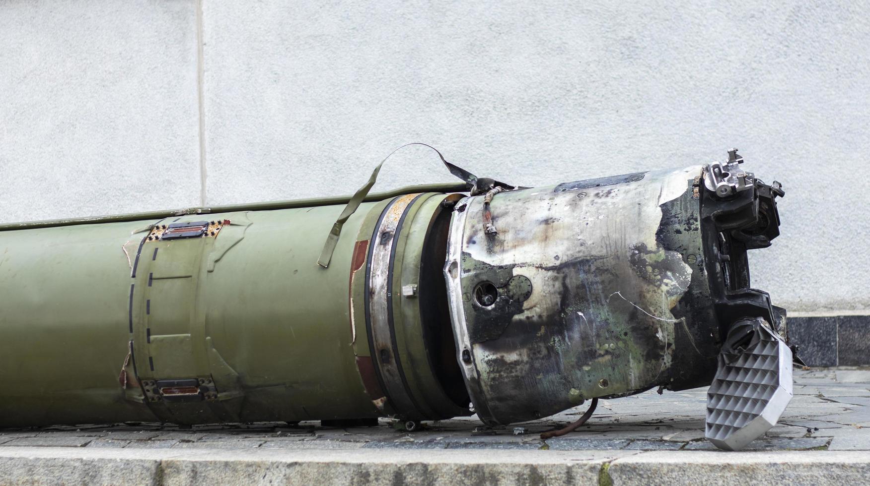 Parts of a tactical ballistic missile, OTR-21. Destroyed Russian military equipment. Spent projectile of the Soviet missile system of the divisional level Tochka U, SS-21 Scarab A, M-21. photo